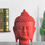 Red Buddha Face Showpiece - @home Nilkamal