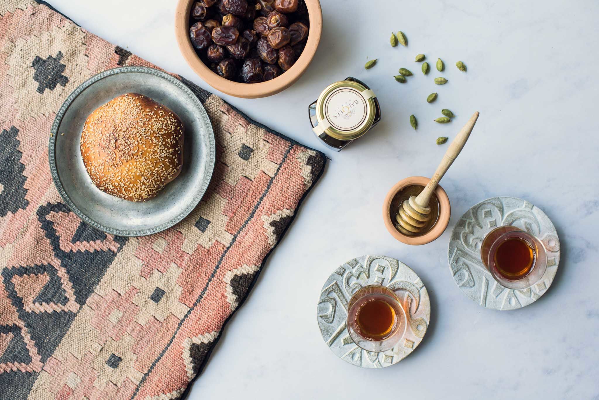 honey, traditional bread, Arabic tea and cardamom pod