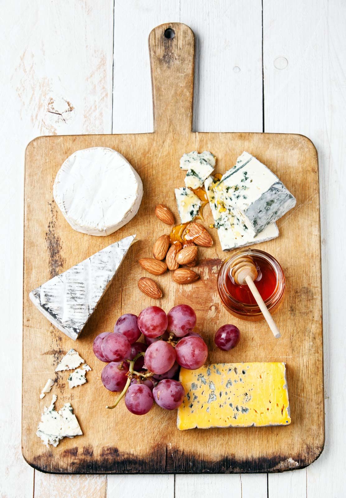 Cheese and honey on a cheese boards